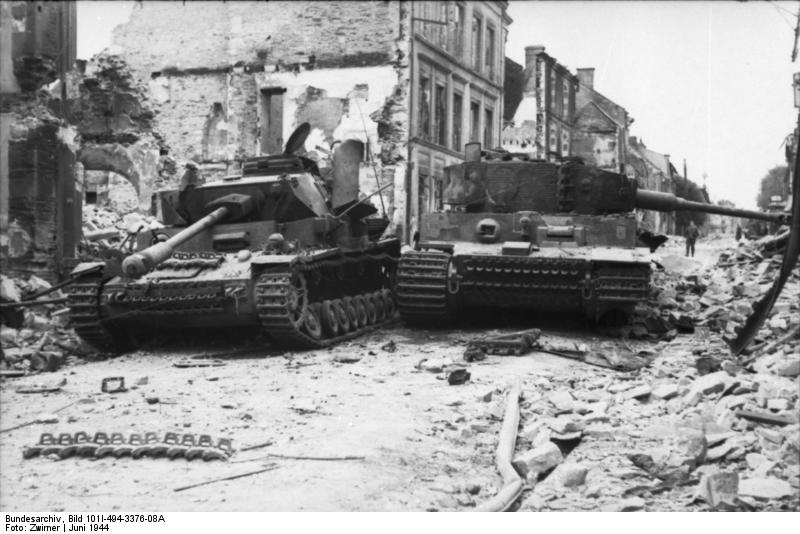 https://upload.wikimedia.org/wikipedia/commons/0/0a/Bundesarchiv_Bild_101I-494-3376-08A%2C_Villers-Bocage%2C_zerst%C3%B6rte_Panzer_IV_und_VI.jpg