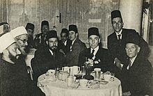 https://upload.wikimedia.org/wikipedia/commons/thumb/2/2b/Al-Banna_and_al-Masri.jpg/220px-Al-Banna_and_al-Masri.jpg