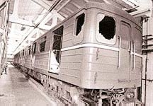 One of the metro cars after the accident, with broken windows to make way for the escape.