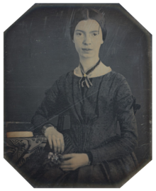 Photograph of Emily Dickinson, seated, at the age of 16