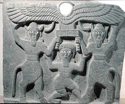 36_211955~relief-depicting-gilgamesh-between-two-bull-men-supporting-a-winged-sun-disk,-from-tell-halaf,-syria.jpg