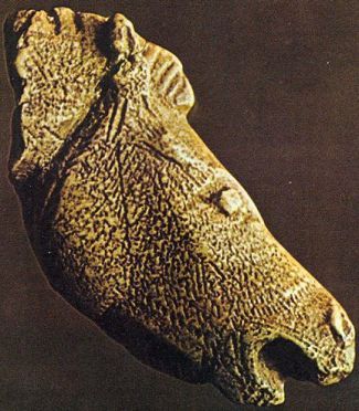 Bone horse head; ca. 12,000 BCE. The structure of the bone did not allow for carving in the round, and the reverse side is flat. Abri du Roc-aux-Sorciers, cave Taillebourg, Angles-sur-L'Anglin (Vienne, France).