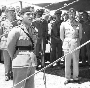 https://upload.wikimedia.org/wikipedia/commons/0/08/King_Hussein_and_Abu_Nuwar%2C_1956.jpg