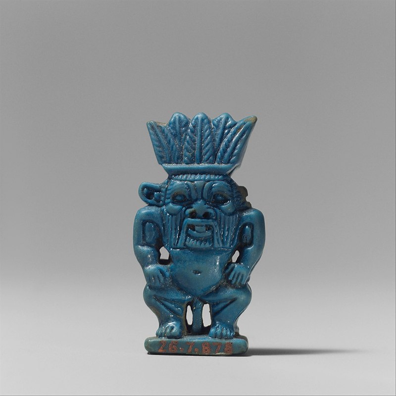 https://upload.wikimedia.org/wikipedia/commons/thumb/2/2a/Amulet_of_the_God_Bes_MET_DP109383.jpg/800px-Amulet_of_the_God_Bes_MET_DP109383.jpg