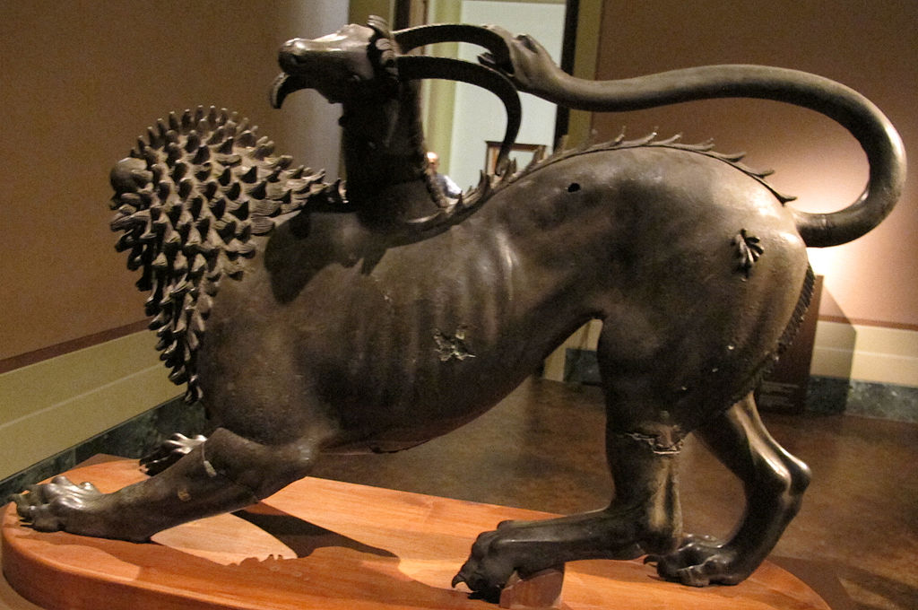 https://upload.wikimedia.org/wikipedia/commons/thumb/6/63/Chimera_d%27arezzo%2C_fi%2C_01.JPG/1024px-Chimera_d%27arezzo%2C_fi%2C_01.JPG