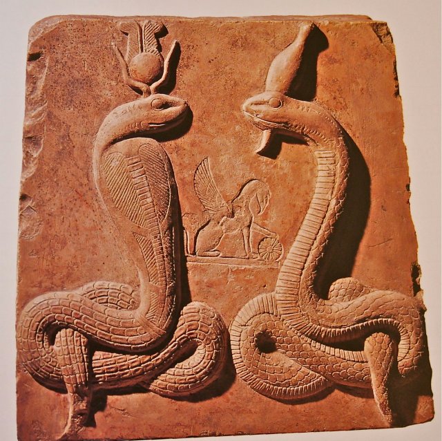 Isis as Agathe Tyche and Osiris as Agathos Daimon in serpent form. Isis as Agathe Tyche and Osiris as Agathos Daimon, both in serpent form.