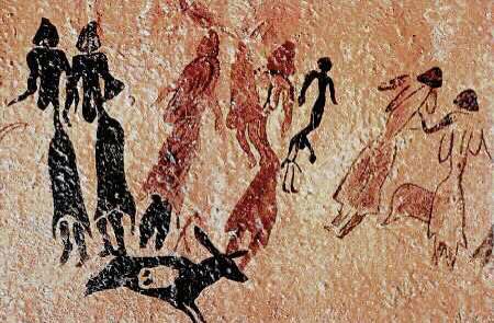 Levantine Rock Art. Caves of El Cogul in Catalonia, Spain. 9 women dancing around a man.