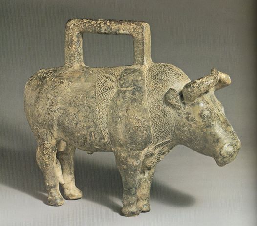 Photo: Weight in the form of a standing bull, northern Afghanistan/ southern Turkmenistan, late 3rd - early 2nd millennium BCE, 12 1/2" long, weighs 10,430g. Said to be one of the largest surviving ancient Near East works made of lead; it appears to have been cast over a core. The feet are quite worn. Miho Museum collection.