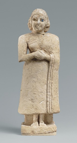 Standing female worshiper Period:Early Dynastic IIIa Date:ca. 2600â2500 B.C. Geography:Mesopotamia, Nippur Culture:Sumerian Medium:Limestone, inlaid with shell and lapis lazuli Dimensions:H. 9 13/16 x W. 3 3/8 x D. 2 1/8 in. (24.9 x 8.5 x 5.4 cm) Classification:Stone-Sculpture