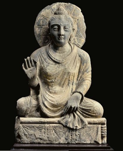 A gray schist figure of the seated Buddha - GANDHARA, 2ND/3RD CENTURY | Christie's