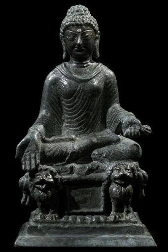 A highly important and rare bronze seated figure of Buddha Swat, Pakistan 6th - 7 th c.; Gandhara Kushan Period bronze 23cm