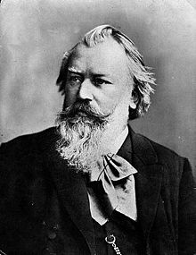 https://upload.wikimedia.org/wikipedia/commons/thumb/1/15/JohannesBrahms.jpg/220px-JohannesBrahms.jpg