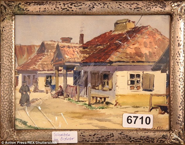 Under the hammer: The Nazi dictator's paintings are up for sale at an auction in Nurenberg in southern GermanyÂ 